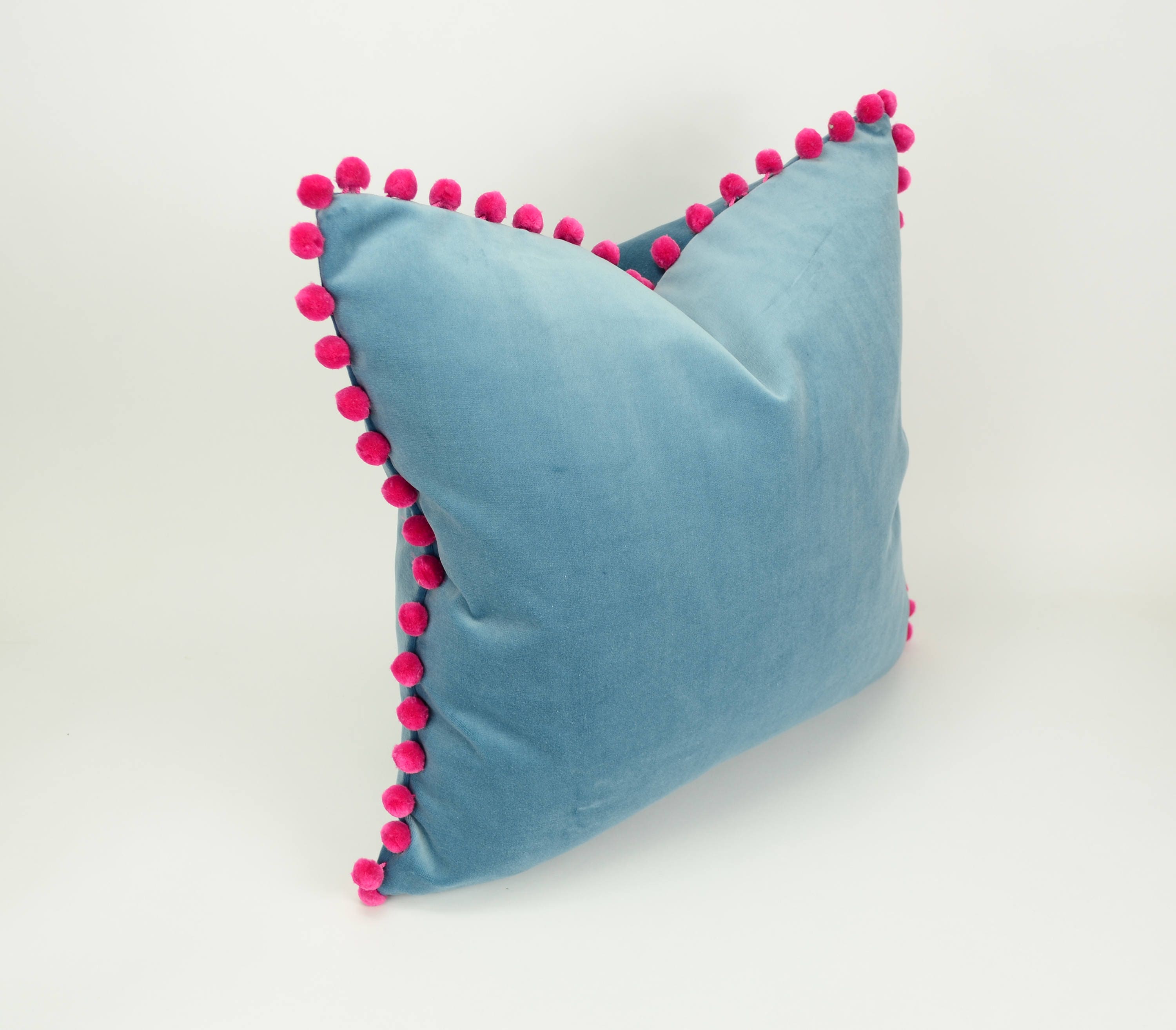 blue velvet pom pom pillow // pink pom pom cushion // blue and pink pillow