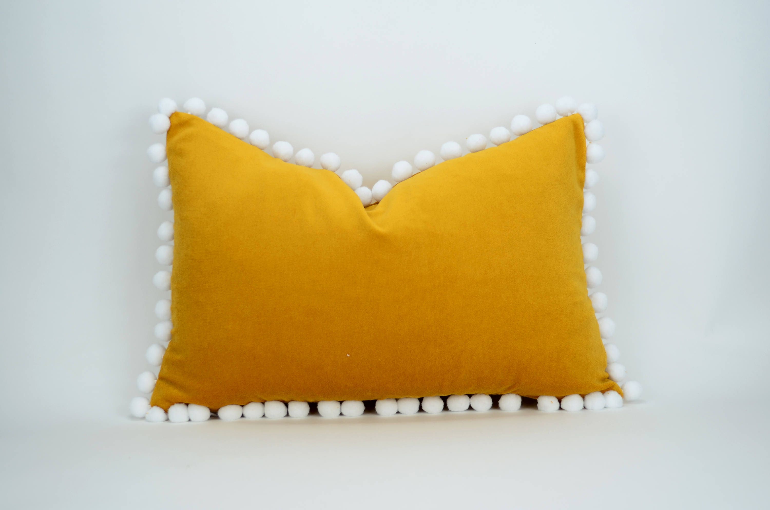 Mustard pillow with pom poms // yellow pom pom cushion // pom pom pillow // mustard velvet pom pillow