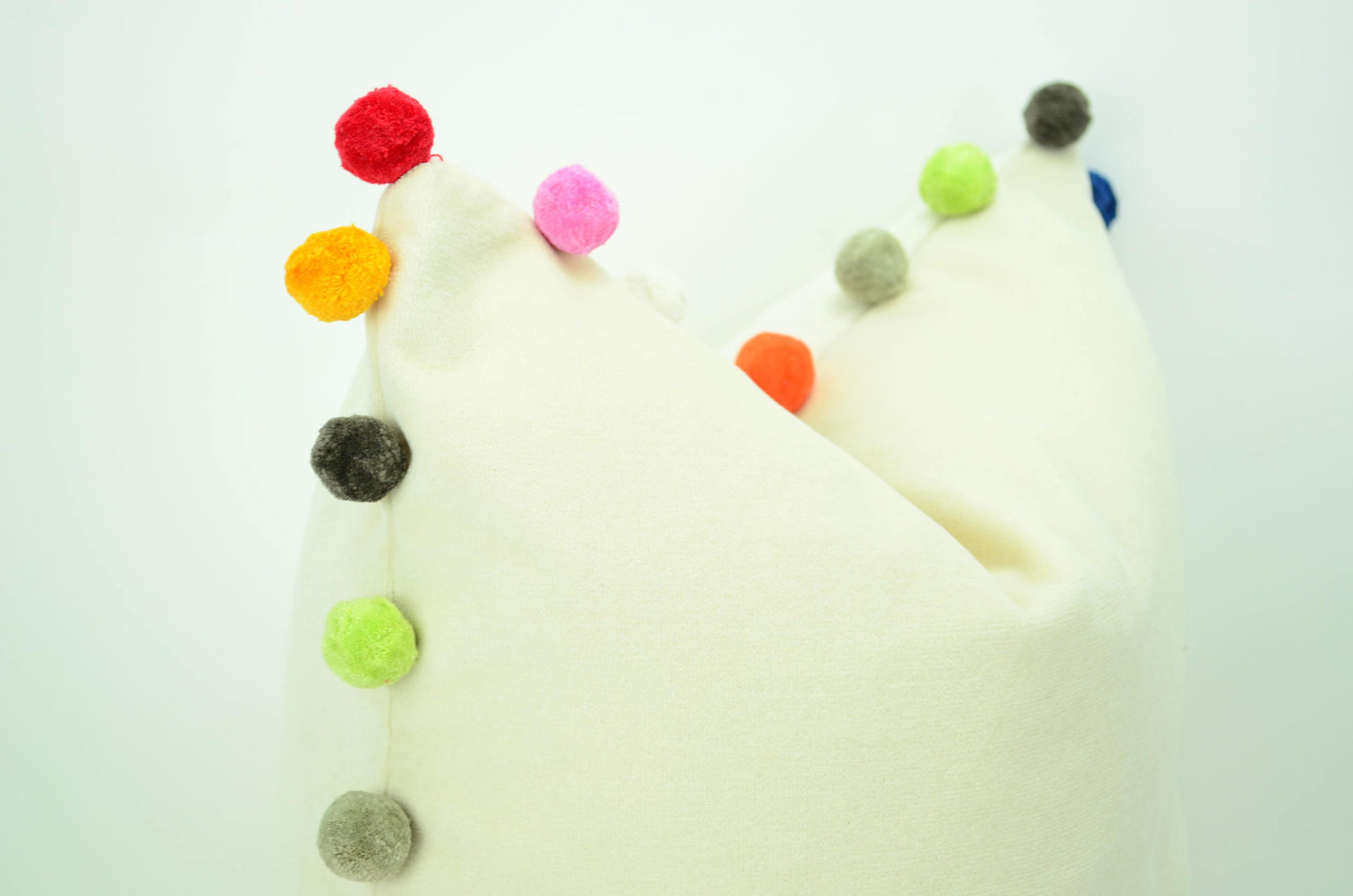 Pom pom pillow // rainbow pom poms // colourful pom pom cushion // jumbo pom pom cushion
