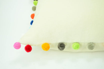 Pom pom pillow // rainbow pom poms // colourful pom pom cushion // jumbo pom pom cushion