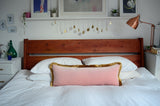 Long lumbar pillow // blush velvet long lumbar pillow // pink and gold pillow // gold fringe pillow